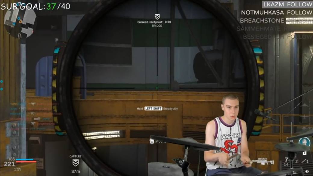 A streamer plays Call of Duty: Modern Warfare with a musical drums