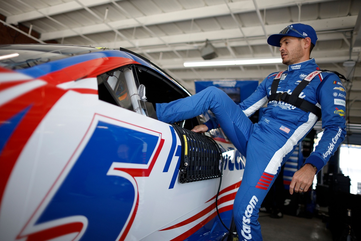 NASCAR ejects car chief and engineer after Timmy Larson & Walker Dye fail inspection twice.